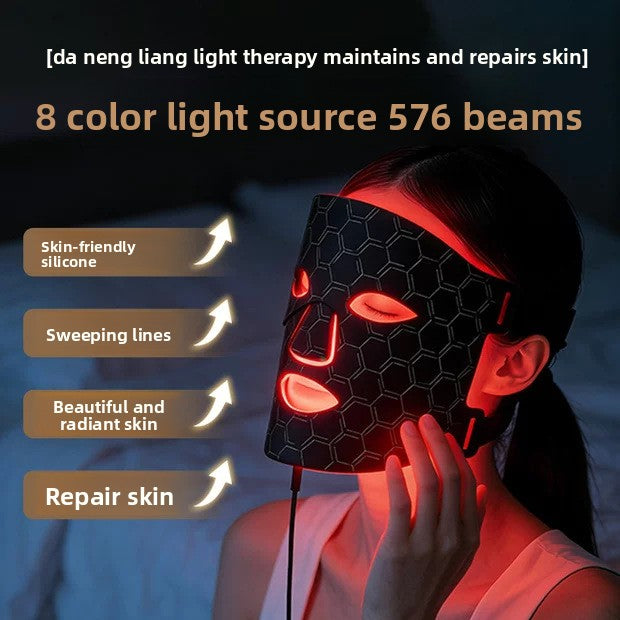 Close-up of the black medical-grade silicone LED mask and wired controller